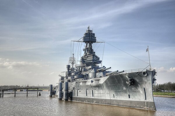 A warship is moored