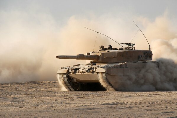 Leopard-2 a4 battle tank in dust and sand