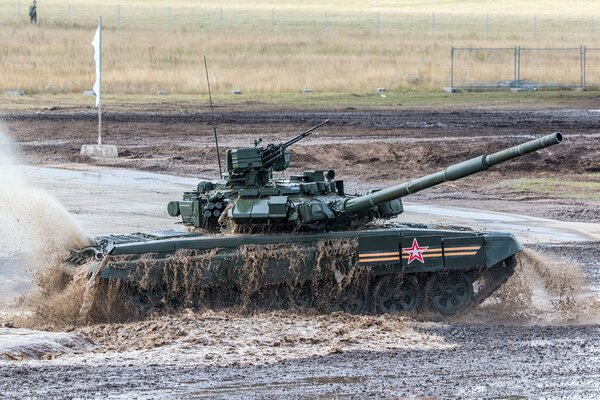 Armored vehicles at the T-90 tank training ground