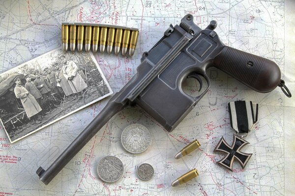 Mauser on the background of photos and bullets