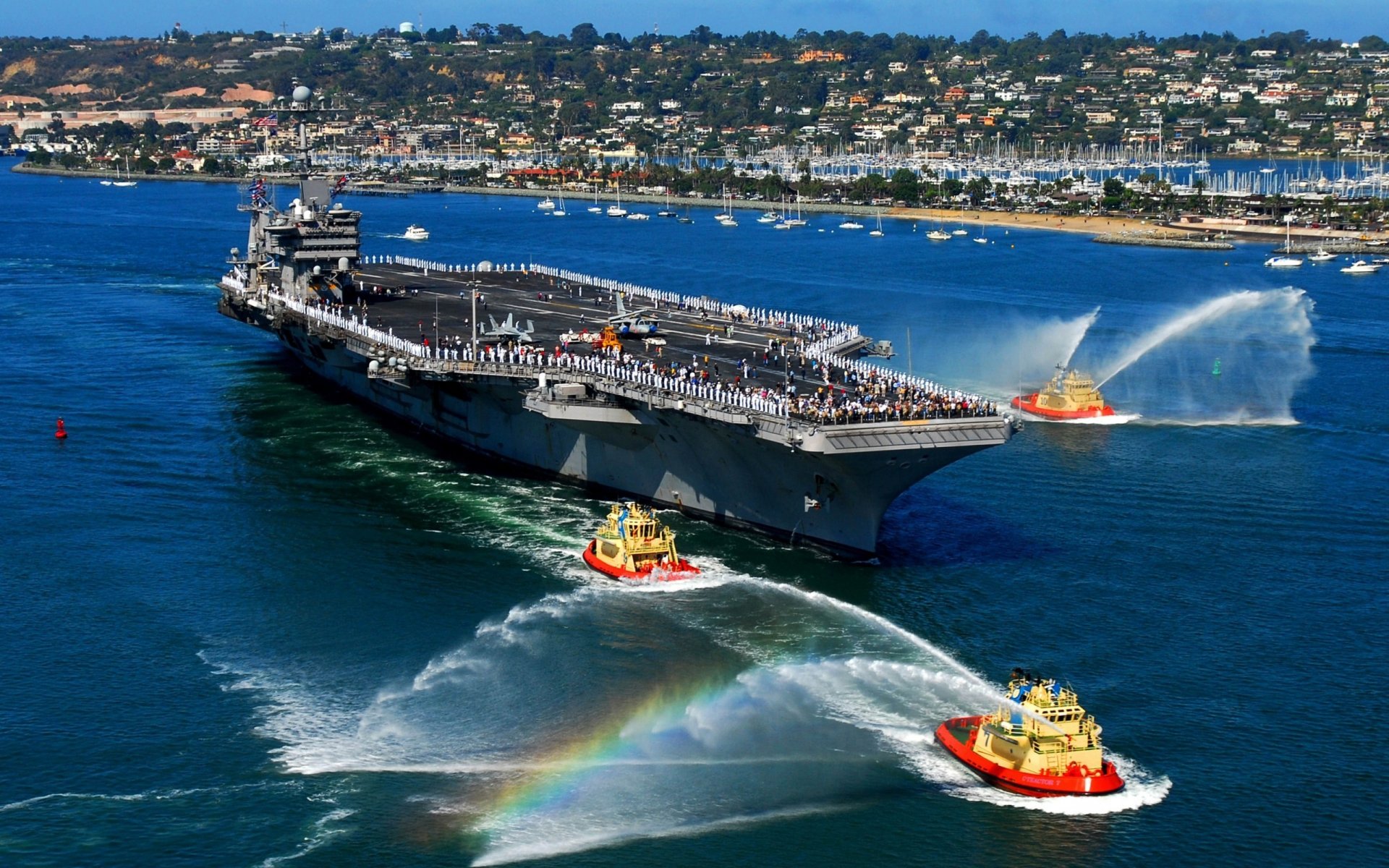 the port the carrier small ships greeting water jet rainbow