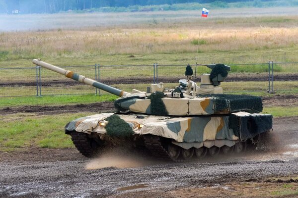 A Russian tank flaunts on a polygon