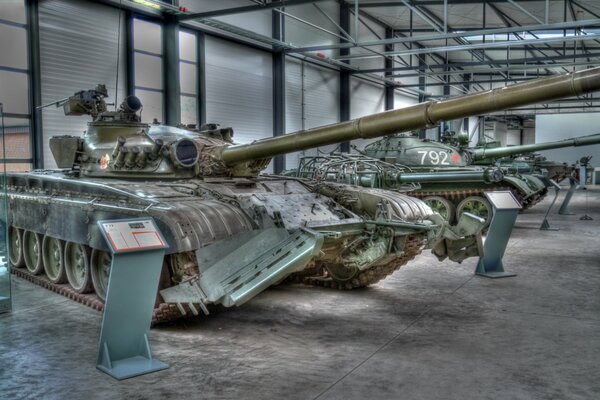 T-72, T-62A tanks in a room with transparent walls