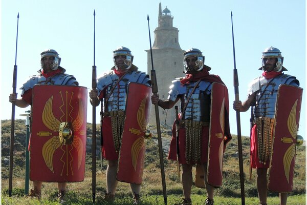 Chityre cavaliere in armatura sullo sfondo di una torre alta