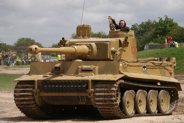 A tank with a tanker driving forward