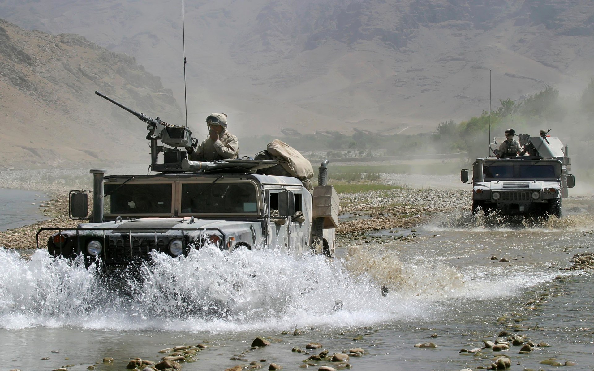 afghanistan mountain river stones military cars hummer men contingent army united state