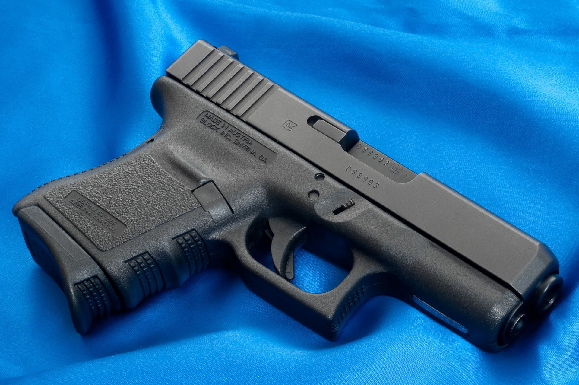 glock weapon wallpaper pistol canvas blue fabric background