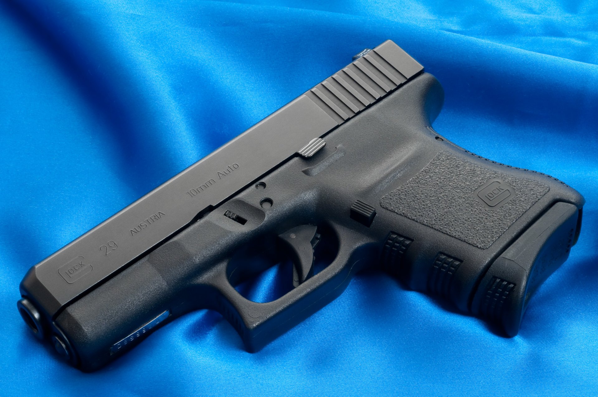 glock pistolet broń tapety lufa austria płótno niebieski tło