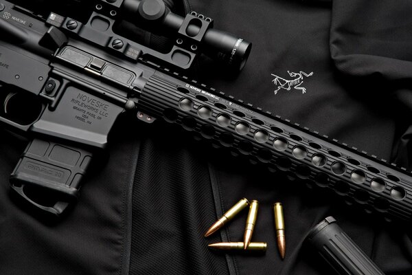 Weapons with cartridges on a black background