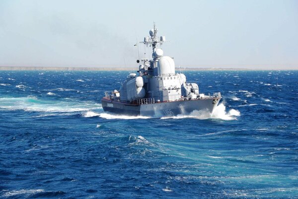 A warship in the blue sea