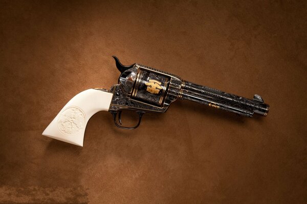 A revolver with a white handle. Colt