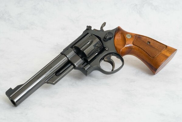 Revolver in good condition with wooden handle