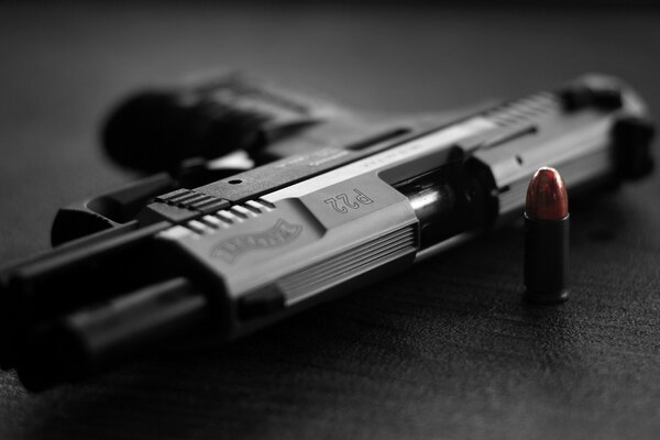 Walther pistol with cartridges on the table