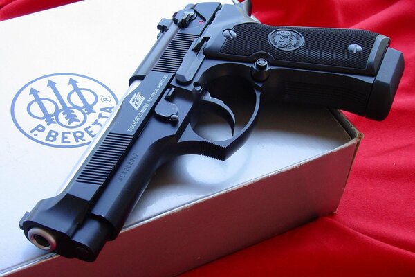 Beretta pistol on the original box