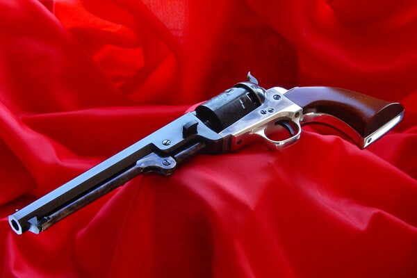 Photo revolver on a red background