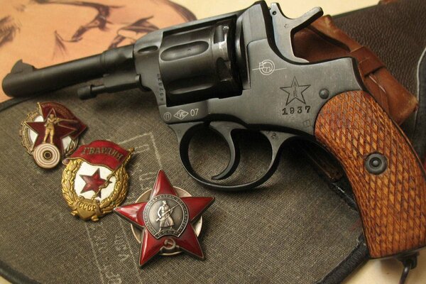 Insignia for the shooter and the legendary revolver