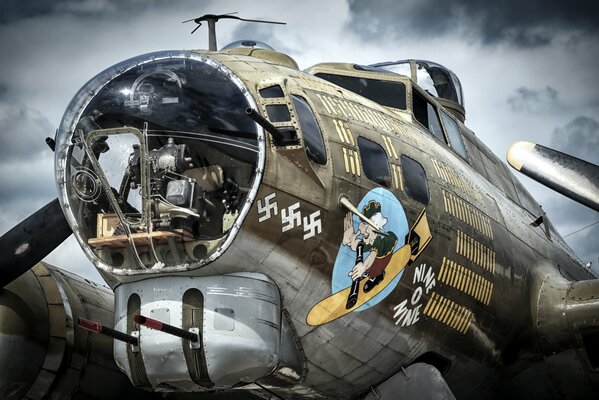 Military aircraft b17 on the background of the sky