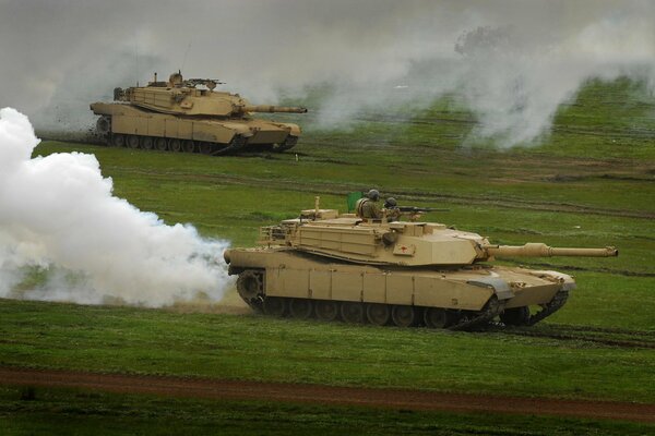 Military exercises with tanks in an open area