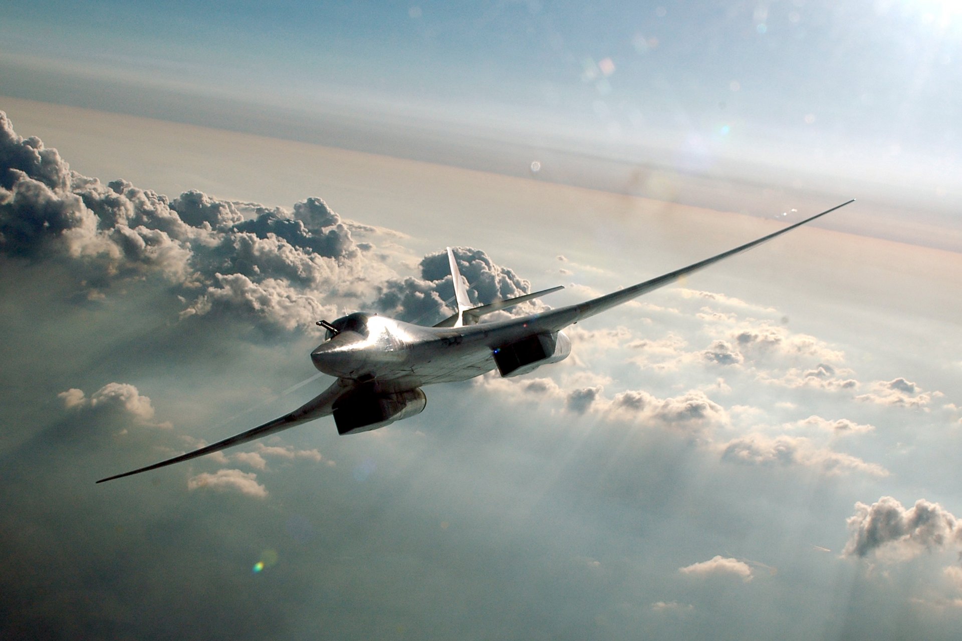 tu-160 white swan supersonic strategic bomber-missile cloud