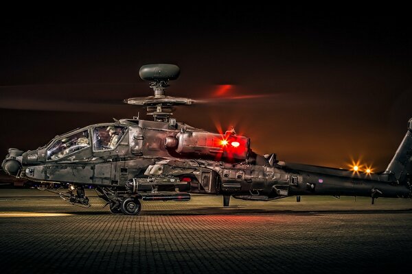 Apache anti-tank helicopter on takeoff