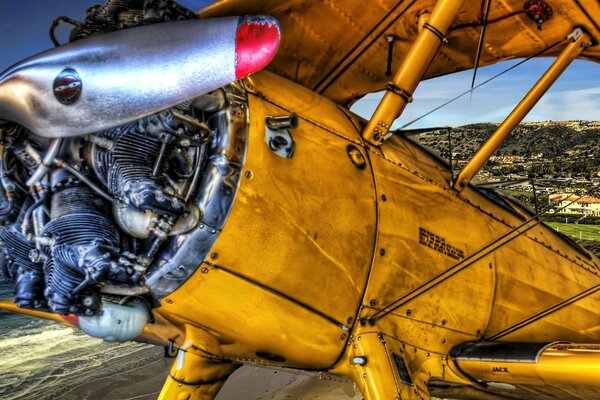 Drawing of an old airplane with a detailed image of the propeller