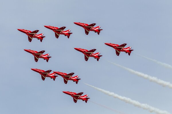 Red arrows on a blue sky background
