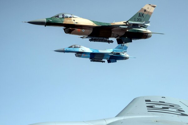 Overview of two aircraft at the wing