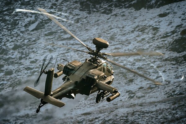 Apache ah-69 attack helicopter over water