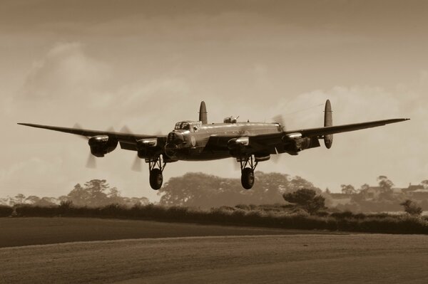 British heavy four-engine bomber takes off in an old photo