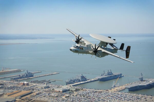 Flight over the military base of the e-2d hawkey aircraft