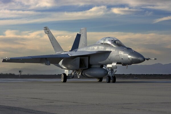 Military aircraft with ammunition on the runway