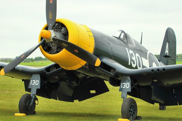 The fighter fg-1 d Corsair stands on the field