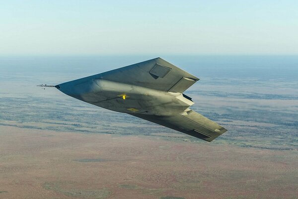 Combat unmanned aerial vehicle in flight