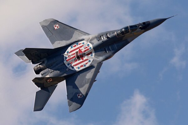 Image of a fighter jet on a blue sky background