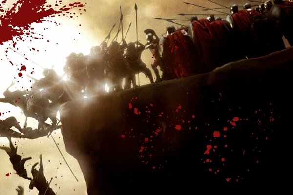 300 Spartans in battle. People are falling down