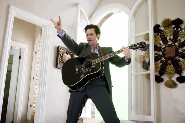 Jim Carrey with guitar movie Always Say Yes