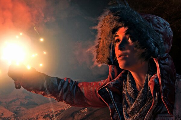 The girl from the game raider tomb holds a torch