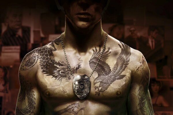 A police badge on the chest of a man in tattoos