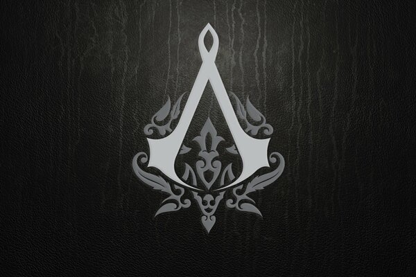 Das Logo des Spiels Assassins Creed auf schwarzem Hintergrund