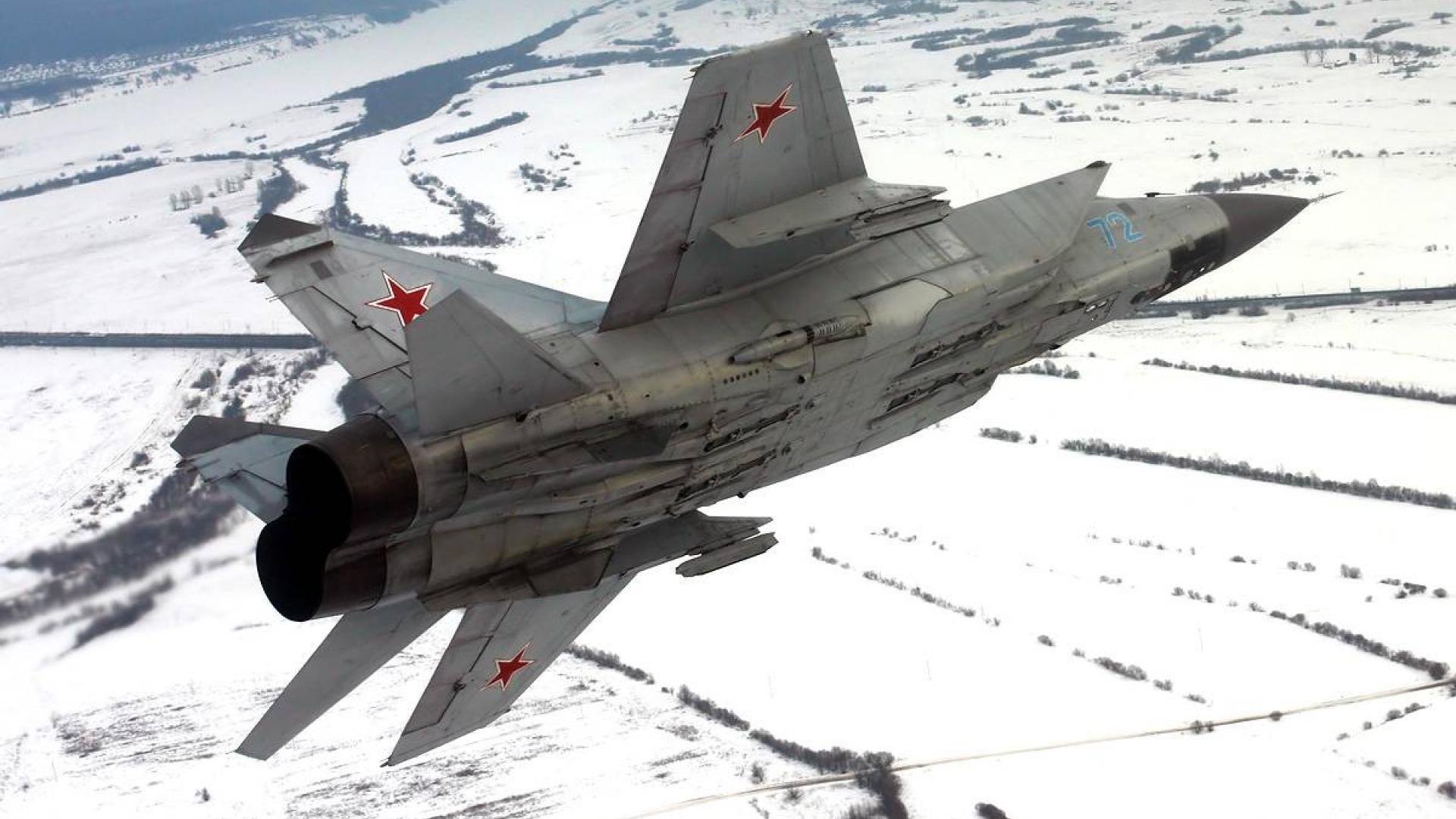 mikoyan and gurevich mig-31 fighter interceptor air force russia military airplane flight altitude wing engine winter snow mikoyan and gurevich .mig-31 fighter russian air force airplane winter