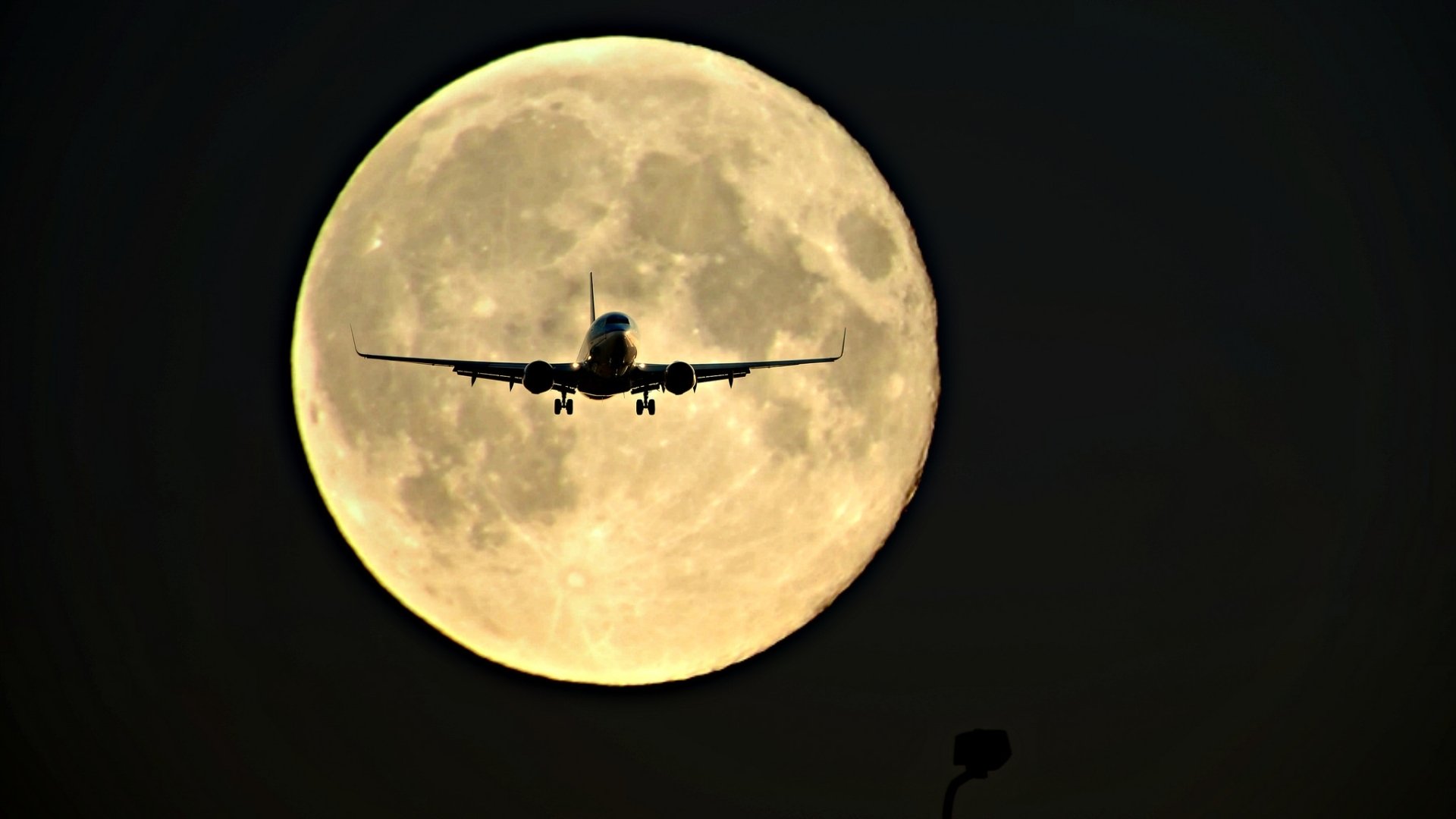 plane moon night silhouette