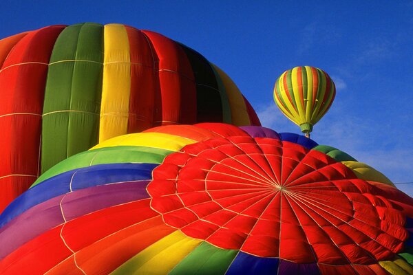 Balloons rise into the sky