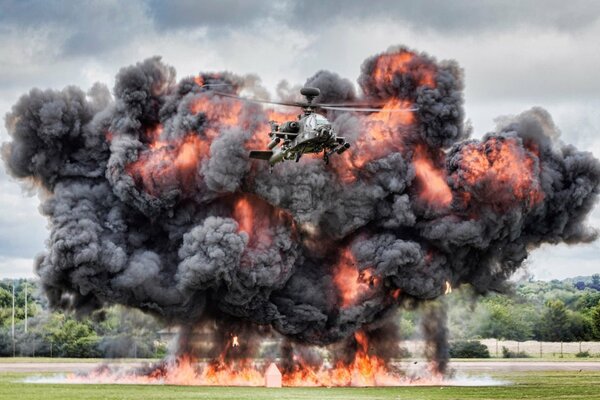 Apache flies out of a powerful explosion