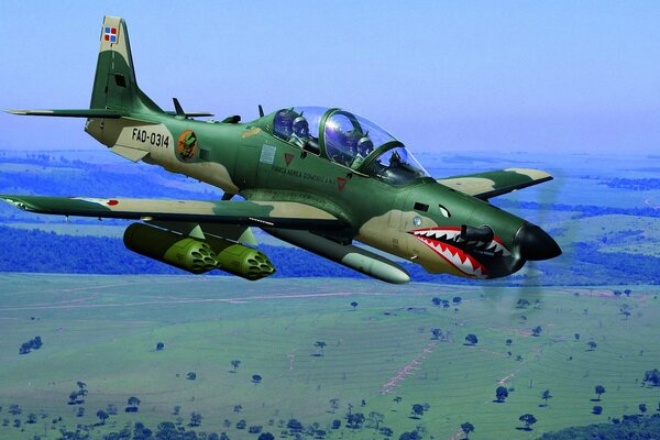 An attack aircraft in flight with a painted mouth