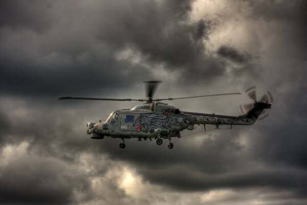 Military transport helicopter in the sky