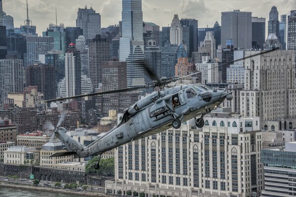 Military helicopter in an American city