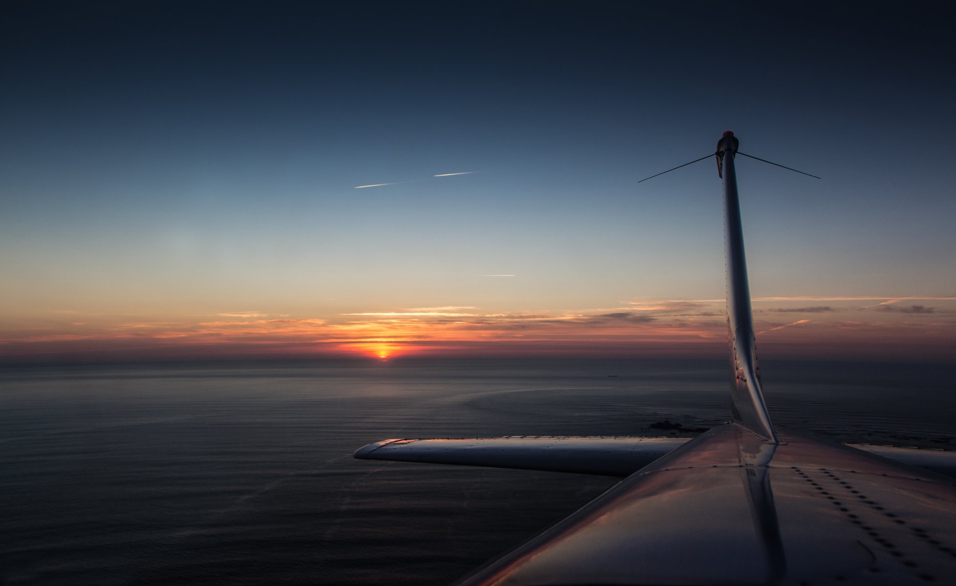 avion cessna coucher de soleil