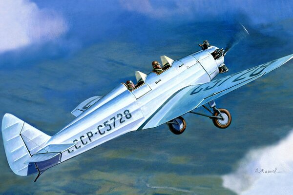 Un aereo monomotore, biposto, Ut-2, effettua un volo di addestramento