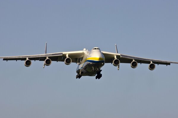 An-225 transport plane flies in the sky