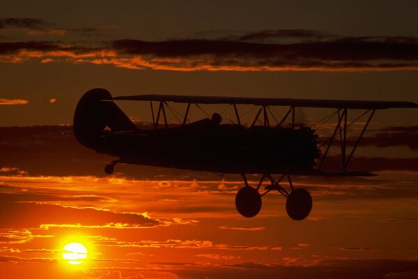 Helicopter silhouette and honey sunset